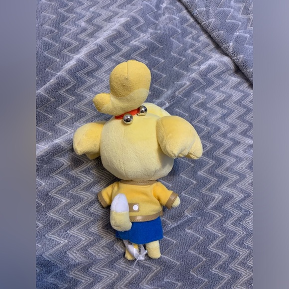 Nintendo. Animal crossing  7+, plushy. 9.5hx4w. Yellow. good used condition. - Picture 2 of 2